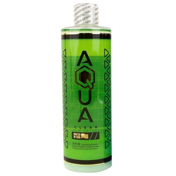 A 16 oz bottle of Aqua Clean hair developer, featuring a bright green label with black text and geometric patterns, sealed with a white and black foil cap.