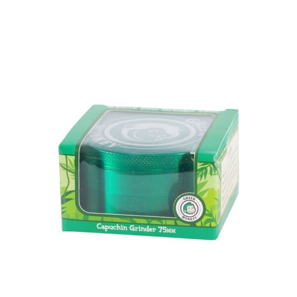 A 75mm green Capuchin grinder in its original green packaging box with a clear window, on a white background.