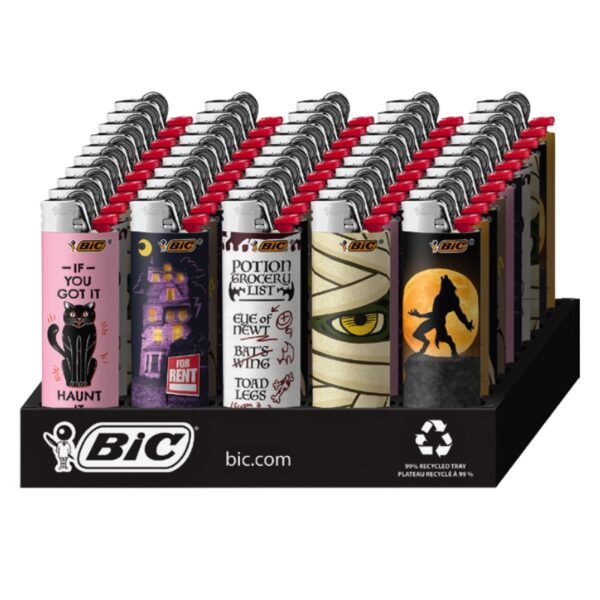 A BIC retail display tray holding multiple Halloween-themed lighter designs, including pink, purple, white, beige, and black patterns with witch, cat, potion, and mummy motifs.
