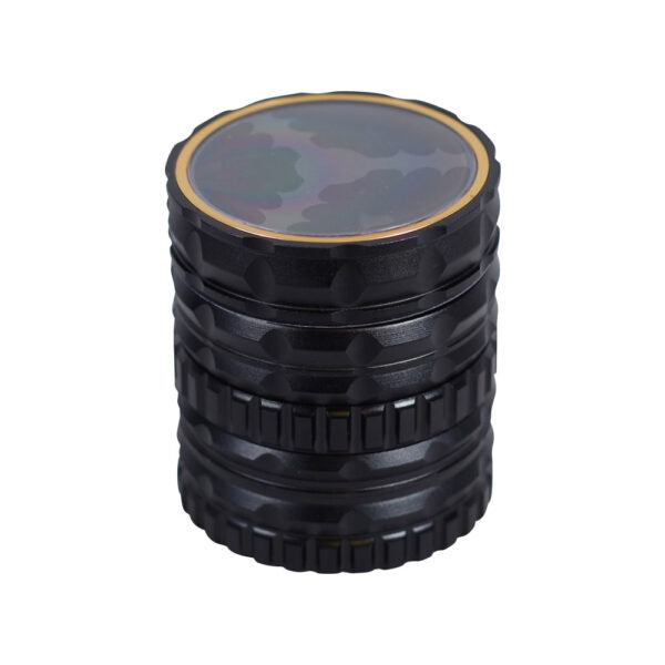 A black cylindrical rolling tray or grinder with a textured, ribbed body and a circular camouflage-patterned top, shown on a plain white background.