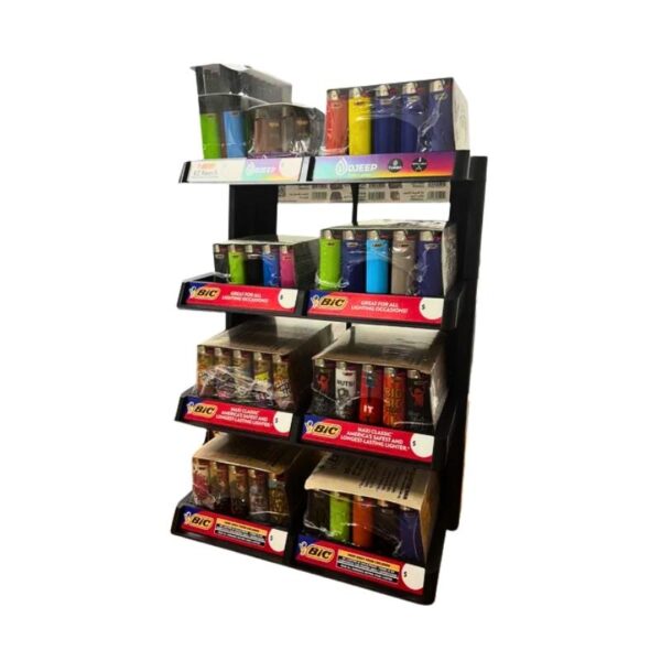 A black retail display rack holding multiple boxed and packaged BIC lighters on a plain white background.
