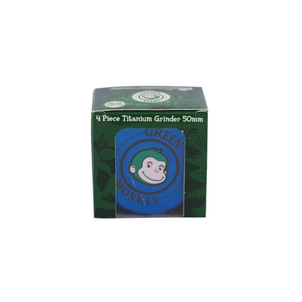 A boxed 4-piece titanium cigarette grinder, 50mm, featuring a green and black package design with a blue circular window showing the green monkey logo.