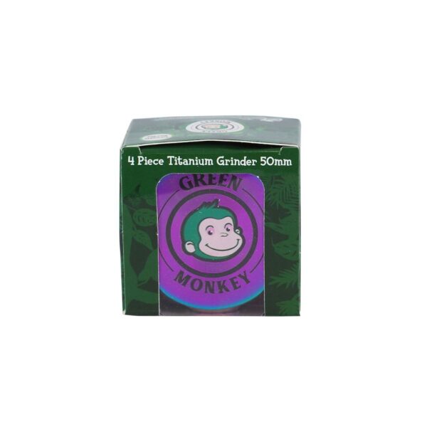 A boxed 4-piece titanium grinder, 50mm, featuring the Green Monkey brand logo on a dark green box with a purple circular label.