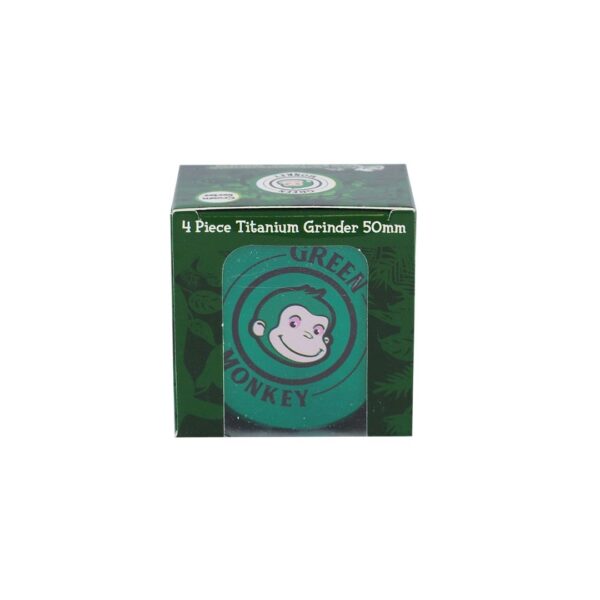 A boxed 4-piece titanium grinder set, 50mm, featuring a green and black box with a clear window showing a green circular grinder with a cartoon monkey logo.