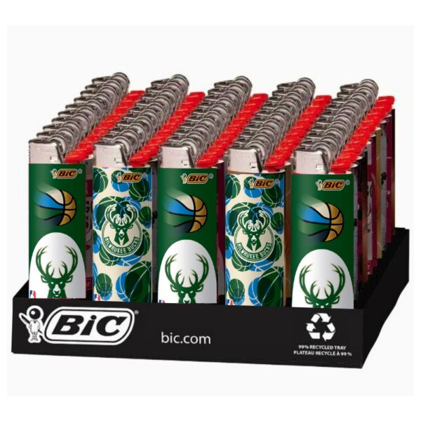A display of BIC lighters featuring the Milwaukee Bucks logo, arranged in a black plastic retail tray on a white background.