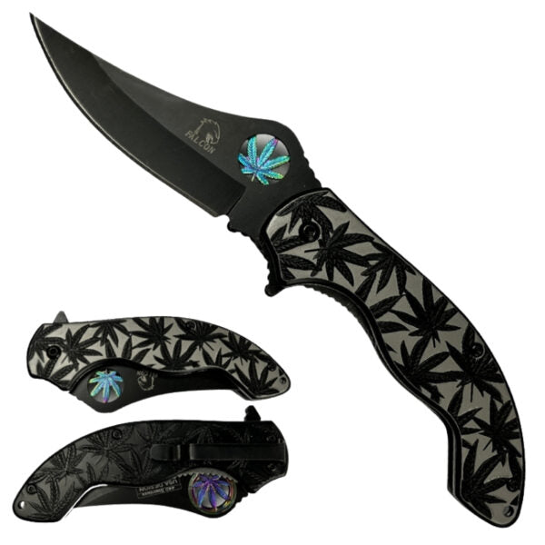 A folding pocket knife shown open and closed on a plain white background. The knife has a matte black blade and frame, a gray handle with an engraved black leaf pattern, and a small iridescent blue-green inlay near the pivot.