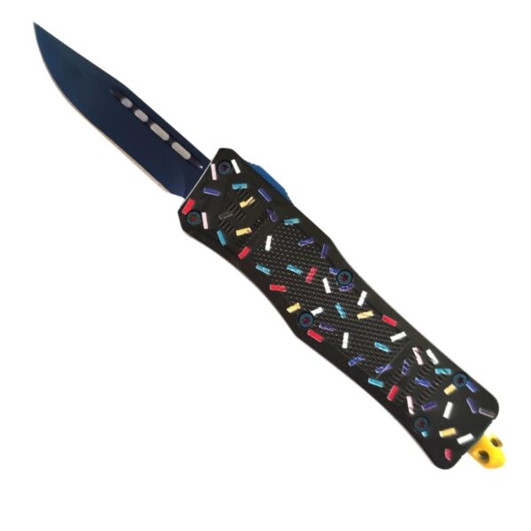 A folding pocket knife with a dark blue blade and a textured black handle decorated with colorful sprinkle-shaped details, shown on a plain white background.