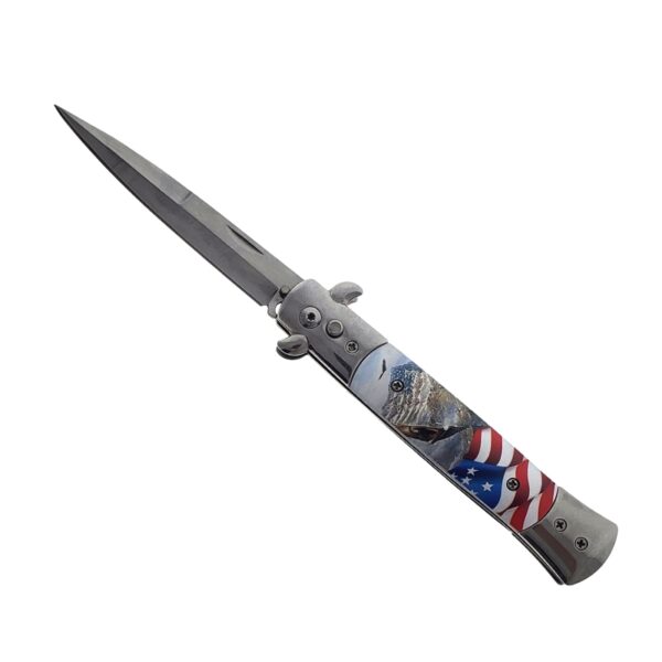 A folding pocket knife with a satin-finished steel blade and a textured handle featuring a patriotic American flag design with a mountain and eagle graphic.