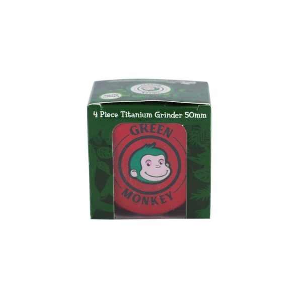 A green cardboard box for a 4-piece titanium grinder, 50mm, featuring the iconic red and green Green Monkey logo on the front.