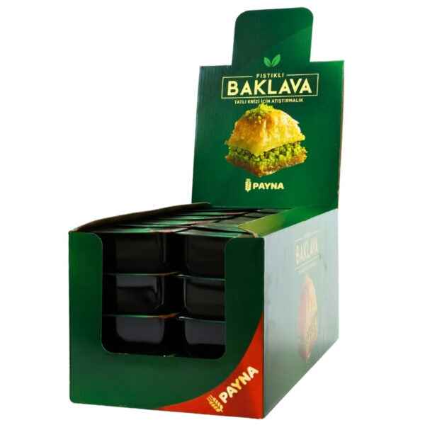 A green display box of Payna pistachio baklava, showing multiple individual packets inside through a window on the front, with a product photo of a baklava piece on the top panel.