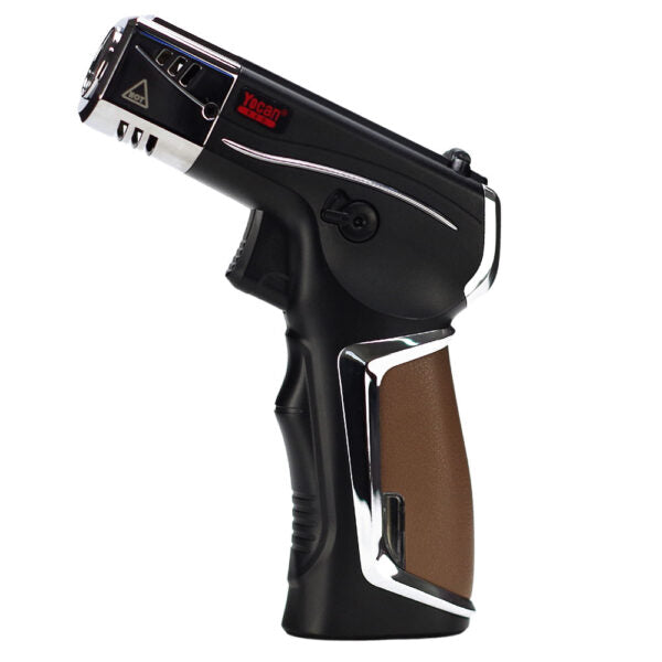 A handheld lighter torch with a black body, silver metallic trim, and a brown textured grip on the handle, shown against a plain white background.