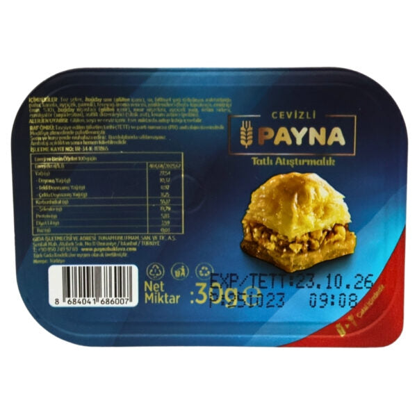 A packaged food product labeled PAYNA Cevizli Tatlı Aştırmılı, shown from the back of the package with product information, barcode, and a photo of the pastry on a blue and red label.