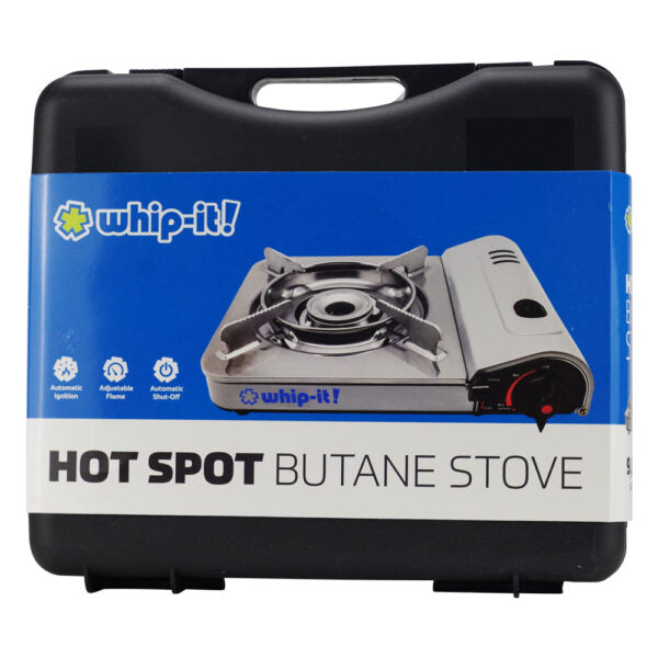 A portable single-burner butane stove in its retail packaging, featuring a blue and white label with the brand name 'whip-it!' and product name 'HOT SPOT BUTANE STOVE'. The stove itself is silver with a black burner grate.
