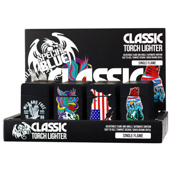 A retail display box of Special Blue Classic Torch Lighter single flame refills, showing four black canisters with colorful custom designs including a skull, a multicolor crest, an American flag, and a red rose, on a white background.