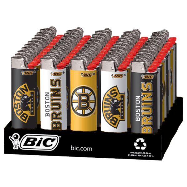 A retail display of BIC Boston Bruins lighters arranged in rows on a black branded stand. The lighters feature the Boston Bruins logo in black, yellow, and white, with red tops and silver metal tops.