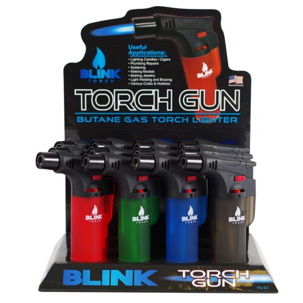 A retail display of four Blink Torch butane gas torch lighters in red, green, blue, and black, mounted on a branded black cardboard backing.