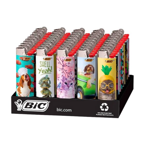 A retail display tray filled with BIC lighters featuring colorful cartoon and animal illustrations on the front, with red plastic tops and silver metal bodies, photographed on a white background.