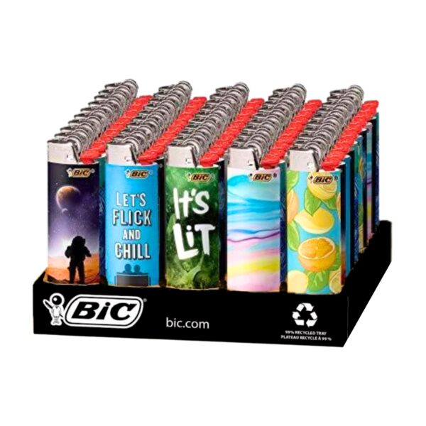 A retail display tray filled with BIC novelty pocket lights. The front row shows five distinct printed designs: a space-themed lighter, a blue 'LET'S FLICK AND CHILL' lighter, a green 'IT'S LIT' lighter, a pastel rainbow lighter, and a lemon-themed lighter.