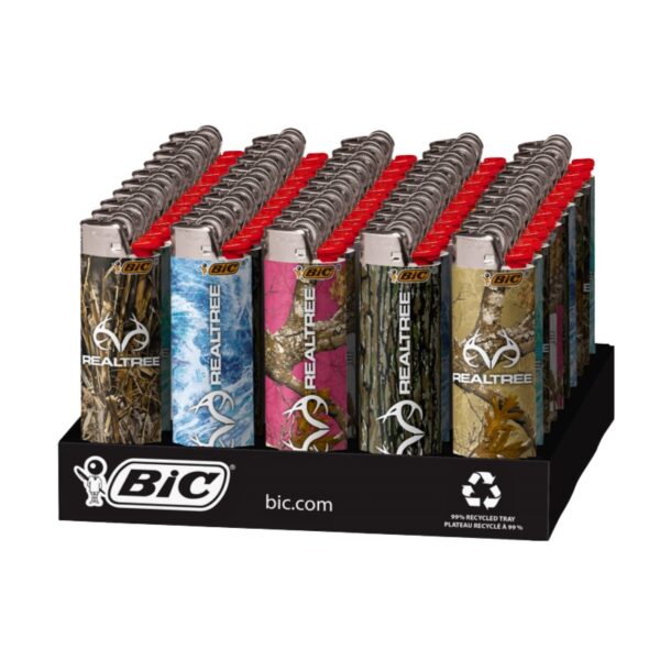 A retail display tray of BIC Realtree lighter matches, showing multiple silver metal lighter tops with red caps and camouflage-patterned bodies in Realtree camo and blue, pink, and gold designs, set against a plain white background.