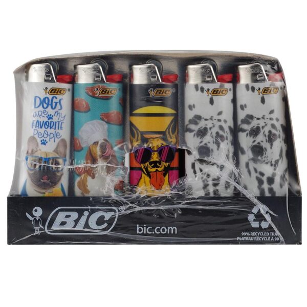 A retail pack of five BIC recycled plastic lighters featuring various dog-themed designs, sealed in a clear plastic clamshell package with a black cardboard base.