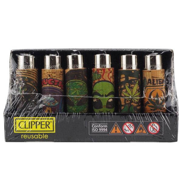 A set of six reusable Clipper lighters in a black retail box, wrapped in clear plastic. The lighters feature various colorful designs including wood grain, green aliens, and cannabis leaves.