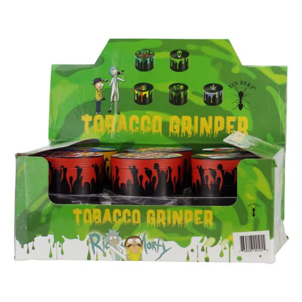 A six-pack display box of Rick and Morty 'Tobacco Grinder' disposable vapes. The packaging is bright green with black splatter graphics, yellow dripping text, and illustrations of Rick and Morty.