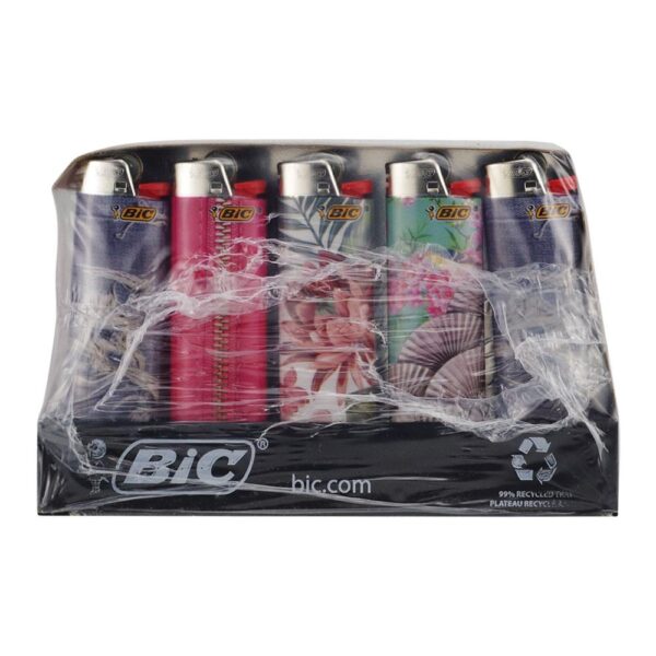 A six-pack of BIC lighters wrapped in clear plastic on a white background. The lighters feature various designs, including floral, fan, and striped patterns in pink, green, purple, and red.