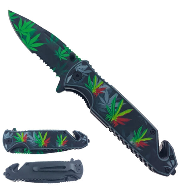 A tactical folding knife with a dark gray handle and blade featuring a green, red, and yellow leaf pattern, shown open with its sheath and pocket clip on a white background.