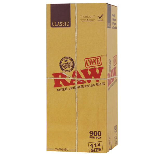 A tall cardboard box of RAW Cone Rolling Papers, Classic Size, 900 count per box. The packaging is a natural tan color with red and black branding text, sealed with a twine band.