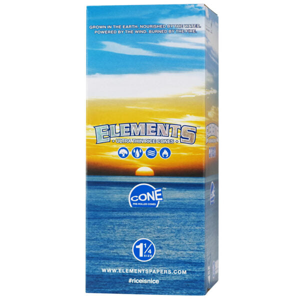 A tall rectangular box of Elements ConE paper towels with a blue and yellow ocean sunset design on the front, photographed on a plain white background.
