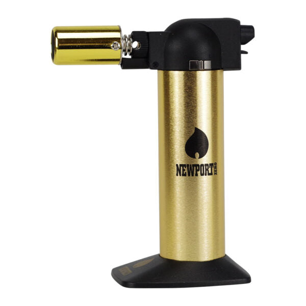 A torch lighter with a brushed gold body and black accents, featuring the Newport brand logo on the front, set against a plain white background.
