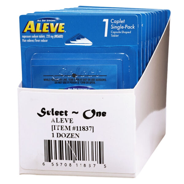 A white cardboard display box holding multiple blue single-serve packets of ALEVE caplet tablets, with the front packet showing the ALEVE logo and text.