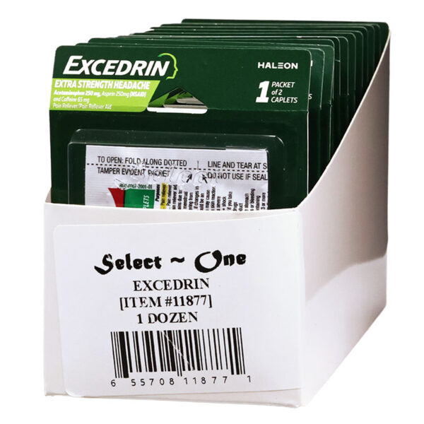 A white cardboard display box holding multiple green Excedrin headache relief packet cards, with a large white label on the front reading 'Select One EXCEDRIN [ITEM#11877] 1 DOZEN'.