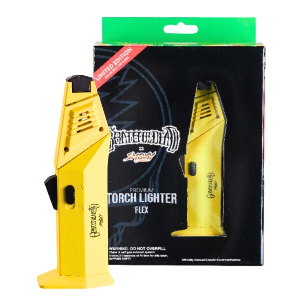 A yellow and black Santaféto Premium Torch Lighter Flex standing next to its black retail packaging box with a green top flap on a white background.