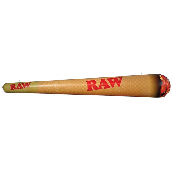 An inflatable RAW brand rolling joint wall sign or light, shaped like a rolling joint with a tan and gold textured body, red RAW logos, and a dark brown to orange flame effect at the tip, shown against a plain white background.