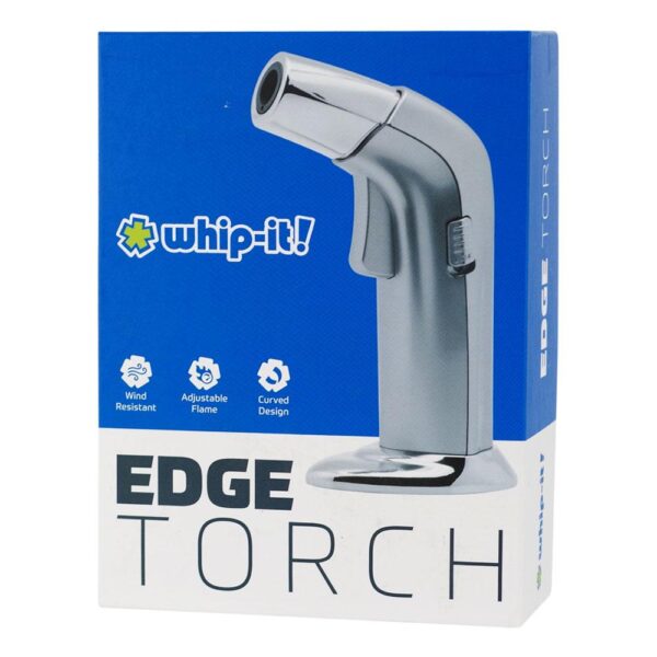 Box packaging for the Edge Torch whip-it! personal burner, showing a silver torch-shaped device on a blue and white background with product features listed on the front.