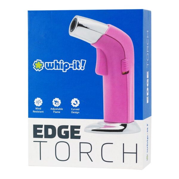 Box packaging for the whip-it! Edge Torch, showing a pink and silver handheld torch lighter on a blue and white background with product features listed on the front.