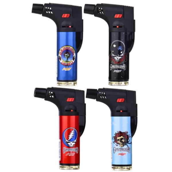 Four St. George's Fireworks themed torch lighters arranged in a 2x2 grid on a white background, featuring blue, black, red, and light blue bodies with Grateful Dead artwork.