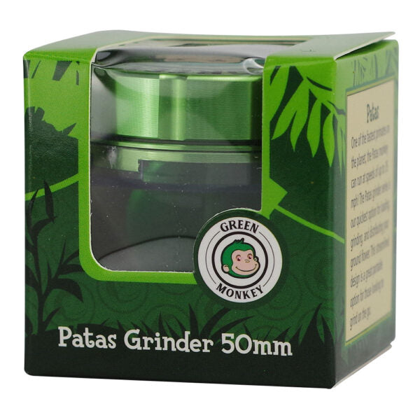 Green Monkey Patas Grinder 50mm in its original green packaging box with a clear plastic window. Green