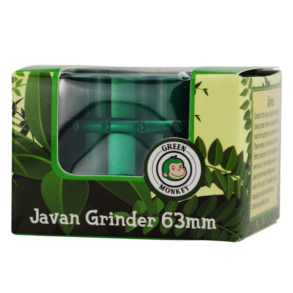 Javan Grinder 63mm in its original retail packaging, featuring a green and black box with leaf patterns and a clear window showing the green grinder inside. The brand logo 'Green Monkey' is visible on the front.