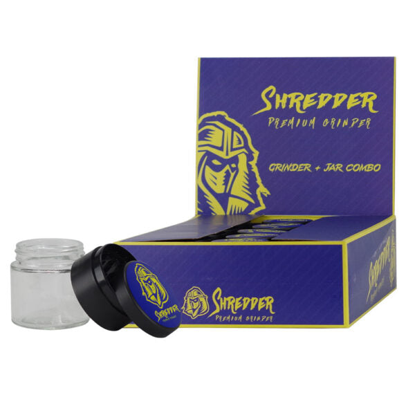 Shredder Premium Grinder jar combo box in purple and yellow, with a clear glass jar and black grinder lid shown in front on a white background.