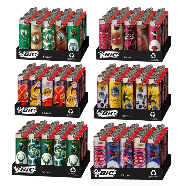 Six display stands of BIC Lighters arranged in a 2x3 grid on a white background. Each stand holds multiple lighter packs in different flavor and color designs, including green, pink, brown, yellow, and blue packs with red BIC tops. NBA Teams and Basketball