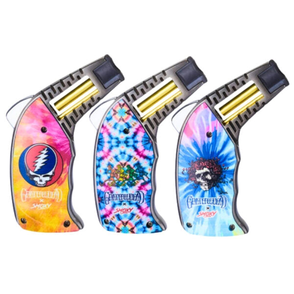 Three Grateful Dead Steppenwolf flame torches with tie-dye designs, displayed side-by-side on a white background.