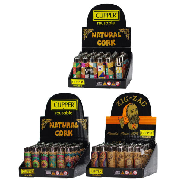 Three black Clipper reusable display stands filled with patterned natural cork lighter tops, shown on a white background. The stands feature different designs: a top stand with 'NATURAL CORK' and a middle stand with 'ZIG-ZAG' and a bearded man illustration.