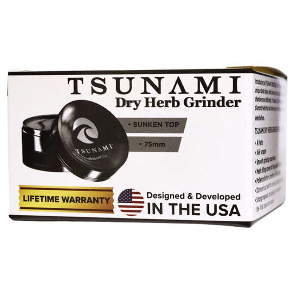 Tsunami Dry Herb Grinder box, featuring a white package with black text, a graphic of the black grinder, and a gold 'Lifetime Warranty' banner.