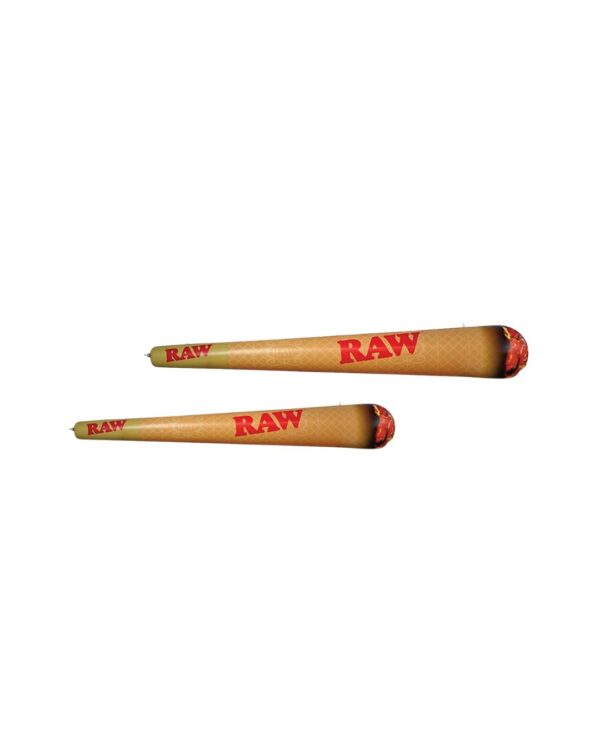 Two RAW brand rolled joints on a plain white background.