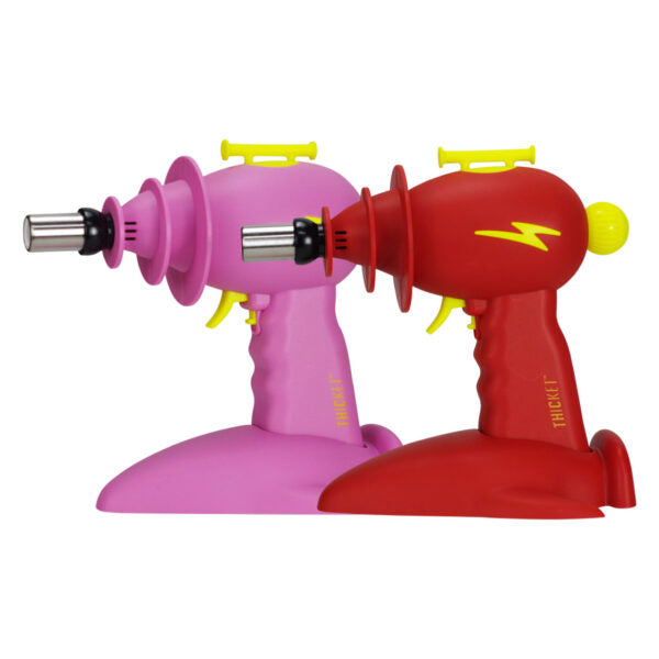 Two Torch Lighters in pink and red with yellow accents, displayed side-by-side on a white background.
