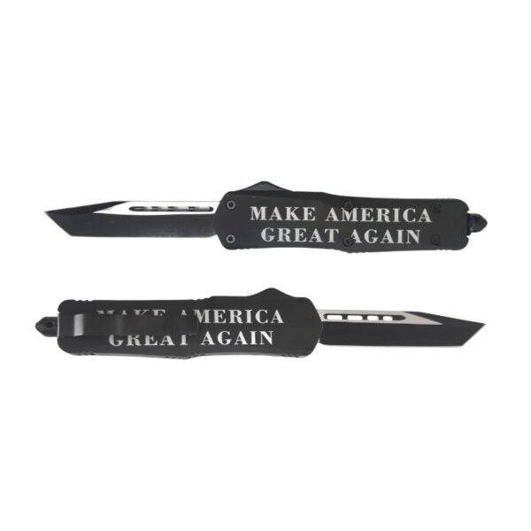 Two black folding knives with white text reading 'MAKE AMERICA GREAT AGAIN' on a plain white background.