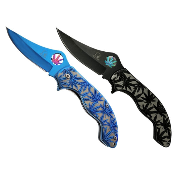 Two folding pocket knives with a cannabis leaf pattern, one with a blue blade and handle, and one with a black blade and handle, shown on a white background.