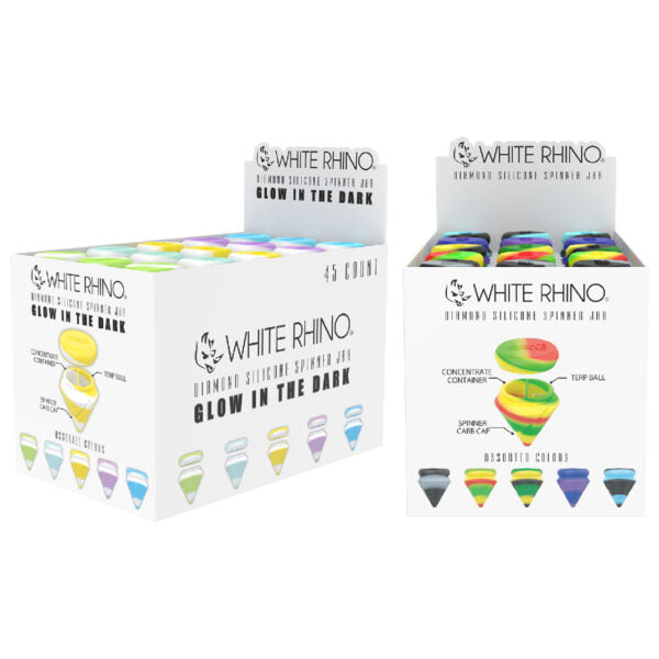 Two white display boxes of White Rhino Diamond Silicone Spinning Jax 'Glow in the Dark' on a plain white background. The boxes show colorful printed diagrams and images of the jax cups, with some cups visible inside the open front of the display boxes.